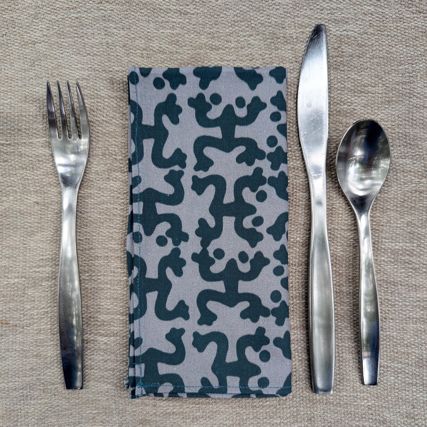 Grey and Teal Taino Coqui Dinner Napkin (Sold Individually)