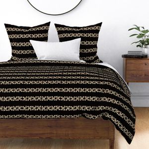 Black & Tan Taino Coquis - Four Designs
